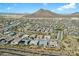 High altitude aerial view of the neighborhood showcasing the well-maintained properties and desert landscape at 12519 W Oyer Ln, Peoria, AZ 85383