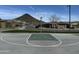 Community basketball court offers a recreational space with mountain views, surrounded by neighborhood homes at 12519 W Oyer Ln, Peoria, AZ 85383