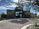 Stunning exterior view of the community clubhouse featuring modern architecture and desert landscaping at 12519 W Oyer Ln, Peoria, AZ 85383