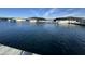 Scenic view from a dock on the lake, highlighting the calm water and boat slips at 12519 W Oyer Ln, Peoria, AZ 85383