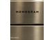 Close-up of the 'Monogram' brand on a stainless steel kitchen appliance at 12519 W Oyer Ln, Peoria, AZ 85383