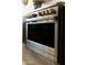 A stainless steel oven with chrome knobs and accents at 12519 W Oyer Ln, Peoria, AZ 85383