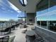 Resident pool patio area featuring comfortable chairs, a cozy fire pit, and desert mountain views at 12519 W Oyer Ln, Peoria, AZ 85383