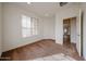 Bedroom with neutral carpet, a window with blinds, and recessed lighting; freshly painted and move in ready at 15222 N 138Th Dr, Surprise, AZ 85379