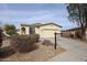 Beautiful single-story home with desert landscaping and a two car garage at 15222 N 138Th Dr, Surprise, AZ 85379