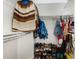 Organized walk-in closet with shelving and ample storage space at 15558 N 136Th Ln, Surprise, AZ 85374