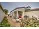 Inviting back patio with comfortable seating and lush landscaping, perfect for outdoor relaxation and entertaining at 16118 W Vista North Dr, Sun City West, AZ 85375