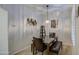 Cozy dining room featuring a stylish table and decorative lighting at 16118 W Vista North Dr, Sun City West, AZ 85375