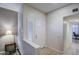 Bright entryway featuring wood floors and a white front door at 16118 W Vista North Dr, Sun City West, AZ 85375