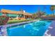 Inviting backyard pool with lush landscaping and a spacious patio area perfect for outdoor entertaining at 16402 N 48Th Way, Scottsdale, AZ 85254