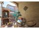 Outdoor balcony with seating offers neighborhood views and shade at 1722 N 77Th Gln, Phoenix, AZ 85035