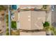 Aerial view of a backyard featuring a pool, patio, and green lawn at 1737 E Marquette Dr, Gilbert, AZ 85234