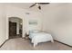 Bedroom featuring a calming color scheme, neutral carpet, and a ceiling fan at 1737 E Marquette Dr, Gilbert, AZ 85234