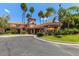 Elegant community clubhouse entrance with covered drop-off area, showcasing its welcoming appeal at 1737 E Marquette Dr, Gilbert, AZ 85234