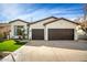 Charming single-story home with a well-manicured lawn, inviting curb appeal, and a two-car garage at 1737 E Marquette Dr, Gilbert, AZ 85234