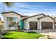 Charming single-story home with a well-manicured lawn, inviting curb appeal, and a two-car garage at 1737 E Marquette Dr, Gilbert, AZ 85234