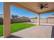 This backyard has a large patio, and green grass perfect for Gathering activities and entertaining at 1777 E Dubois Ave, Gilbert, AZ 85298