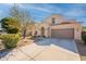 Charming two-story home with a well-manicured lawn, inviting entrance and a spacious two car garage at 1777 E Dubois Ave, Gilbert, AZ 85298