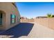 Gravel backyard featuring a block wall providing privacy at 19202 W Jackson St, Buckeye, AZ 85326