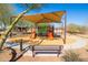 Shaded community playground featuring slides and climbing equipment at 19202 W Jackson St, Buckeye, AZ 85326