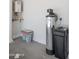 Picture of a utility room that contains a water filtration system and water heater at 19202 W Jackson St, Buckeye, AZ 85326