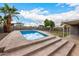 Sparkling swimming pool surrounded by a concrete deck, perfect for relaxation and summer fun at 1925 W Wood Dr, Phoenix, AZ 85029