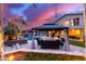 Backyard featuring a gazebo with outdoor seating, creating a relaxing and inviting space at 19349 W Oregon Ave, Litchfield Park, AZ 85340