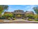 Exterior view of the community center, featuring stone accents and desert landscaping at 19550 N Grayhawk Dr # 2038, Scottsdale, AZ 85255