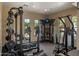 Community fitness center with state-of-the-art weight training equipment and natural light at 19550 N Grayhawk Dr # 2038, Scottsdale, AZ 85255