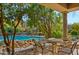 Inviting outdoor lounge with a large pool, comfortable seating, and a tranquil setting at 19550 N Grayhawk Dr # 2038, Scottsdale, AZ 85255