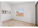 Minimalist bedroom with wood floors, a window with blinds, and a modern decorative rug at 1993 S Spartan St, Gilbert, AZ 85233