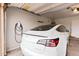 Spacious garage equipped with a charger for electric vehicles, and room for storage at 1993 S Spartan St, Gilbert, AZ 85233