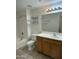 Well-lit bathroom featuring a shower over tub and vanity with storage at 20100 N 78Th Pl # 1007, Scottsdale, AZ 85255