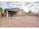 Expansive backyard with a covered patio, perfect for outdoor entertaining and relaxation at 20742 E Mockingbird Dr, Queen Creek, AZ 85142