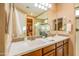 Modern bathroom featuring a double vanity, large mirror, and tile accents at 20742 E Mockingbird Dr, Queen Creek, AZ 85142