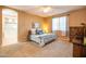 Relaxing bedroom with carpet, ceiling fan and lots of natural light at 20742 E Mockingbird Dr, Queen Creek, AZ 85142