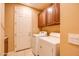 Convenient laundry room with new washer and dryer at 20742 E Mockingbird Dr, Queen Creek, AZ 85142