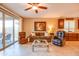 Cozy living room with plenty of natural light and comfortable furnishings at 20742 E Mockingbird Dr, Queen Creek, AZ 85142