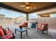 Covered patio with outdoor seating and barbecue grill at 20742 E Mockingbird Dr, Queen Creek, AZ 85142