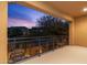 Balcony view of community landscaping and homes during twilight at 20750 N 87Th St # 1137, Scottsdale, AZ 85255