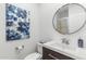 Well-lit powder room with a modern vanity, sleek fixtures, and stylish decor at 20750 N 87Th St # 1137, Scottsdale, AZ 85255