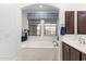 Relaxing bathroom with soaking tub, decorative window shade, and dual sink vanity at 20750 N 87Th St # 1137, Scottsdale, AZ 85255