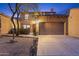 Inviting two-story home featuring a private entry gate, well-manicured desert landscape and a spacious two-car garage at 20750 N 87Th St # 1137, Scottsdale, AZ 85255