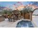 Backyard includes a hot tub and fireplace at 20750 N 87Th St # 1137, Scottsdale, AZ 85255