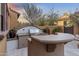 Outdoor kitchen with a built-in grill, counter space, and bar seating perfect for al fresco dining at 20750 N 87Th St # 1137, Scottsdale, AZ 85255