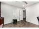 Spacious bedroom with ample natural light, neutral walls, and a door leading into another room at 212 W Interlacken Dr, Phoenix, AZ 85023