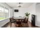 Bright dining room featuring modern lighting, table and chairs, and ample natural light at 212 W Interlacken Dr, Phoenix, AZ 85023