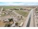 Aerial photograph of a property nestled in a rural community alongside an irrigation canal at 21520 W Watkins St, Buckeye, AZ 85326