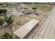 Aerial view of a property featuring trailer parking and covered storage at 21520 W Watkins St, Buckeye, AZ 85326