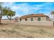 Attractive desert home featuring a private, block-wall enclosed yard perfect for families at 21520 W Watkins St, Buckeye, AZ 85326